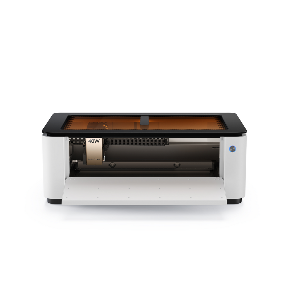 LaserPecker LX2 all-in-one laser cutting machine with front door open, showing 40W laser module and rotating engraving attachment.
