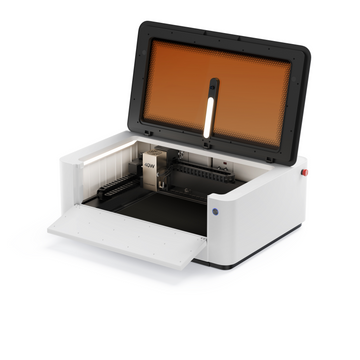 LaserPecker LX2 all-in-one laser cutter with top lid and front door open, showing internal 40W laser module