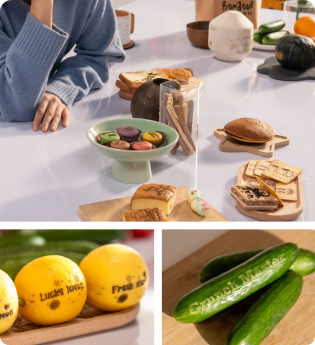 LP1 Plus laser engraver creating custom engraved logos and designs on baked goods, desserts, fresh lemons, and vegetables, highlighting its versatile food-safe and eco-friendly personalization on organic materials.
