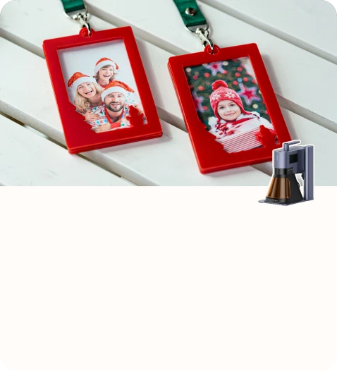 Red custom keychains displaying holiday-themed family photos with festive outfits.